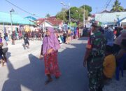 Babinsa Koramil 1311-07/Menui Kepulauan Amankan dan Pantau Lomba Voli Antar Desa dalam Rangka HUT RI ke-79 