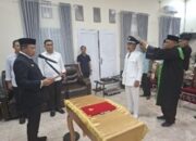 Lantik Penjabat Kades Laroue, Bupati Iksan Baharudin Abdul Rauf Titip Harapan Perubahan Positif Untuk Kemajuan Desa