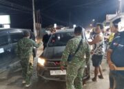 Babinsa dan Linmas Bahodopi Bantu Atasi Kemacetan di Desa Bahodopi
