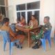Melalui Komsos Babinsa 1311-09/Bahodopi Ajak Aparatur Desa Lele Jaga Kerukunan dan Keaamanan