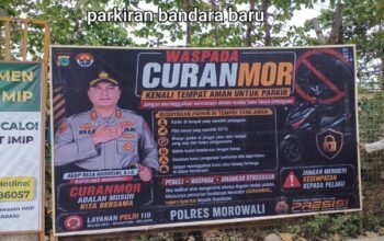Cegah Curanmor! Polres Morowali Pasang 12 Baliho Imbauan di Parkiran PT. IMIP